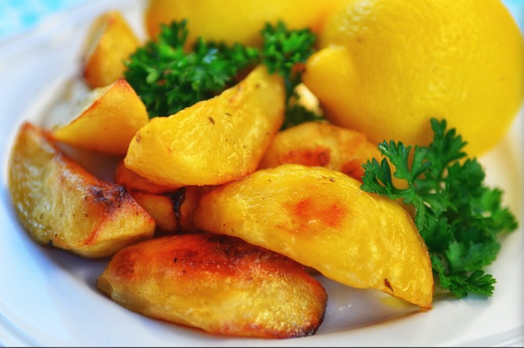 Roasted potatoes with lemon - landscape image